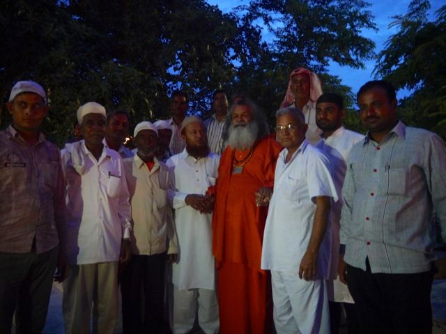 Vishwaguruji and on His left the leader of the Muslim group at the end of the evening