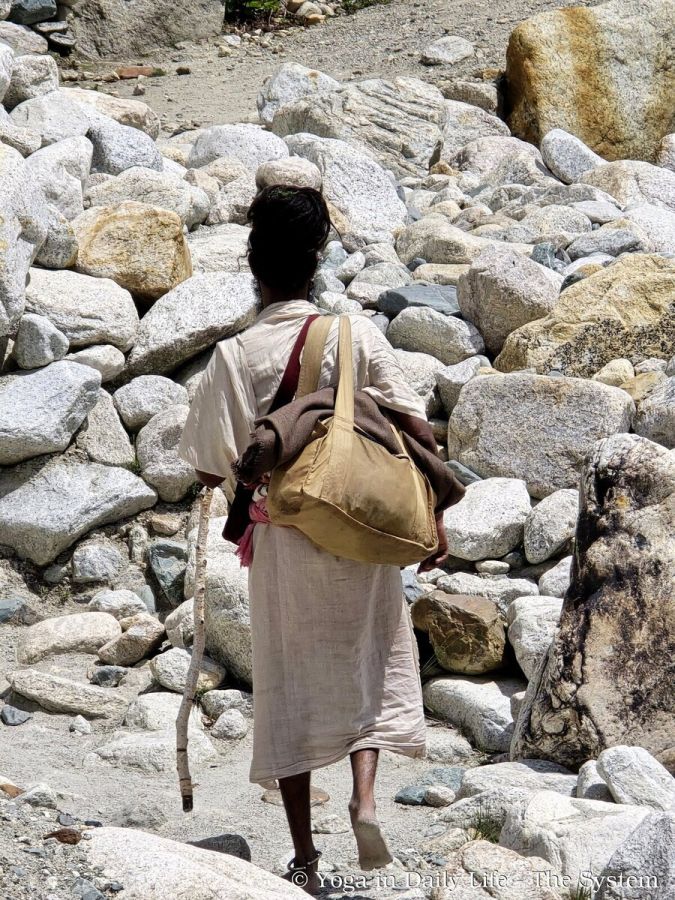 6.9. sadhu walking barefoot wm